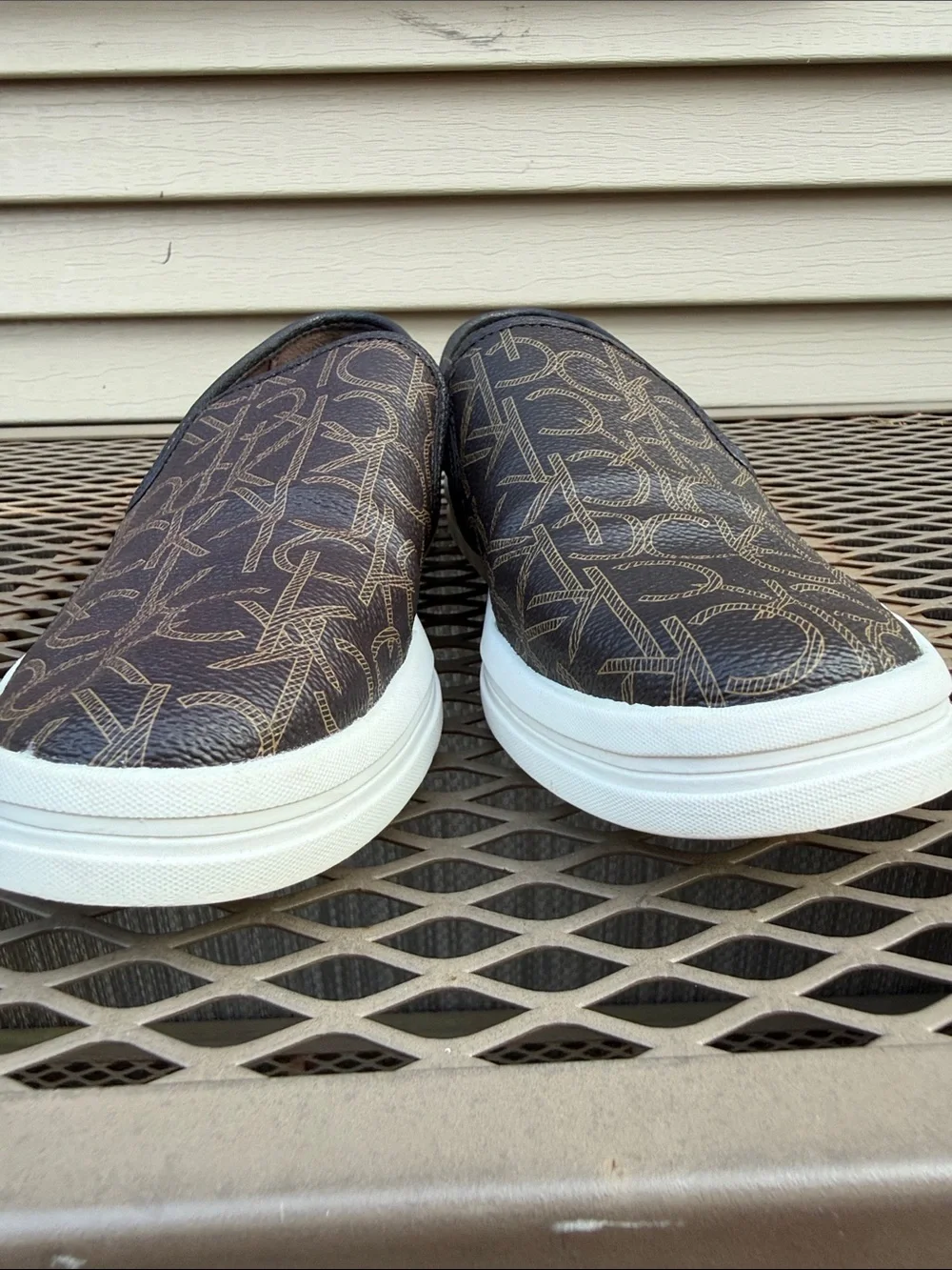 Calvin Klein Women's Black Logo Slip-On Loafer with White Sole